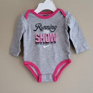 Nike grey & pink 'Running the Show' long sleeve onesie/bodysuit